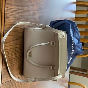 Dooney Bourke handbag in cream color.